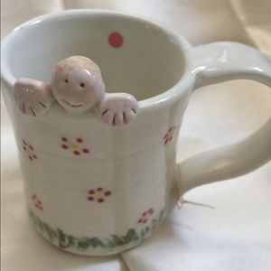 Whimsical peek-a-boo mug